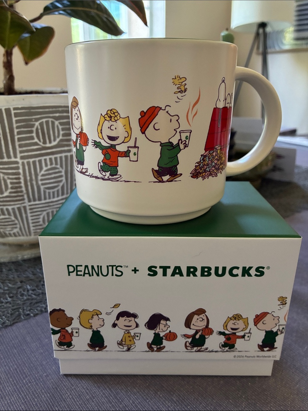Starbucks White Peanuts Characters Ceramic Mug with Green and Red Accents